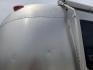 2005 Silver /TAN AIRSTREAM SAFARI - (1STGPYJ295J) , located at 17760 Hwy 62, Morris, OK, 74445, 35.609104, -95.877060 - 2005 AIRSTREAM SAFARI 25.5FT OVERALL WITH 16FT MANUAL AWNING. IN THE LIVING AND KITCHEN AREA IS A SOFA THAT FOLDS DOWN FOR ADDITIONAL SLEEPING, STORAGE UNDER THE SOFA, OVERHEAD CABINETS, FOLD OUT DINETTE TABLE, FOLD OUT END TABLE, 3 BURNING STOVE WITH OVEN, DOUBLE STAINLESS STEEL SINK, OVERHEAD CAB- Photo#35