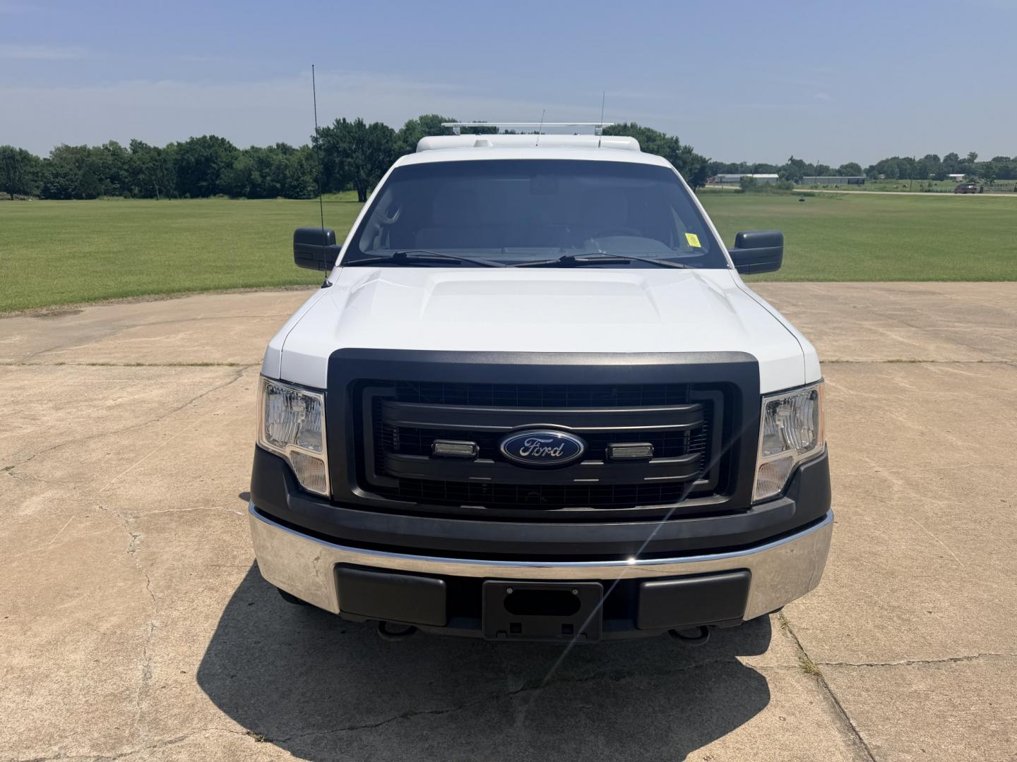 2014 White /Gray Ford F-150 XL (1FTVX1EFXEK) with an 5.0L V8 OHV 16V engine, 6A transmission, located at 17760 Hwy 62, Morris, OK, 74445, (918) 733-4887, 35.609104, -95.877060 - 2014 FORD F-150 4WD HAS THE 5.0L V8 ENIGINE BI-FUEL SYSTEM RUNS ON CNG OR GASOLINE. FEATURES KEYLESS REMOTE ENTRY, CLOTH MANUAL SEATS, POWER LOCKS, POWER WINDOWS, AM/FM STEREO, SIRIUS XM STEREO, CD PLAYER, AUXILLARY PORT, CRUISE CONTROL, TRACTION CONTROL, BACKUP CAMERA, NO BACK SEAT HAS WORK SHELF,- Photo#1