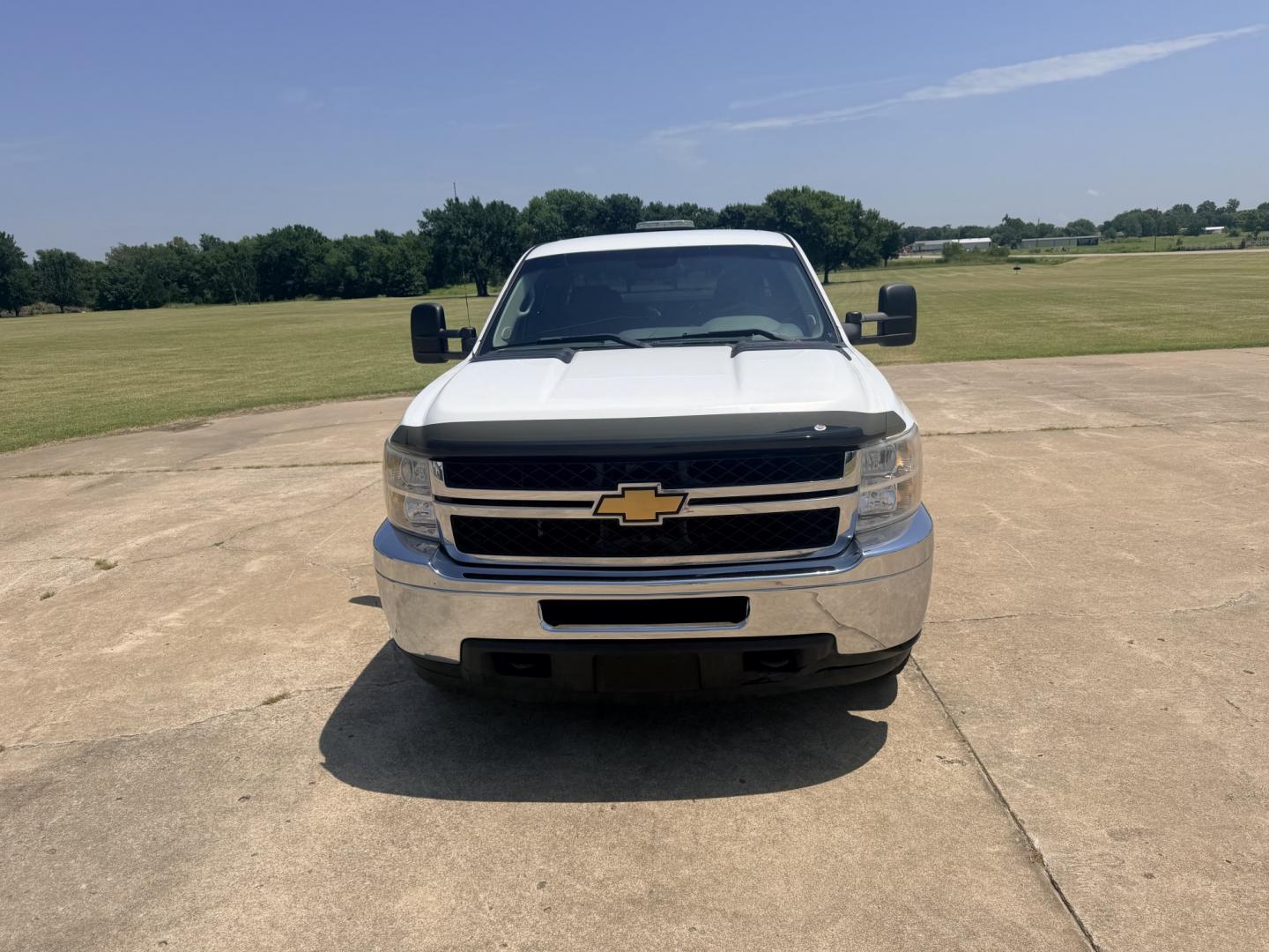 2013 White /BLACK Chevrolet Silverado 2500HD Work Truck Ext. Cab 2WD (1GC2CVCB0DZ) with an 6.0L V8 OHV 16V CNG engine, 6A transmission, located at 17760 Hwy 62, Morris, OK, 74445, (918) 733-4887, 35.609104, -95.877060 - 2013 CHEVY SILVERADO 2500 HD 2WD BI-FUEL SYSTEM RUNS ON CNG OR GASOLINE WITH THE 6.0L V8 ENGINE. IT FEATURES MANUAL SEATS, CLOTH INTERIOR, POWER LOCKS, MANUAL WINDOWS, AM/FM RADIO, CRUSIE CONTROL, TRACTION CONTROL, TAILER BRAKES, SAFETY LIGHT AND BED MATT. ONLY 179,449 MILES WITH FIRESTONE TIRES 245- Photo#2