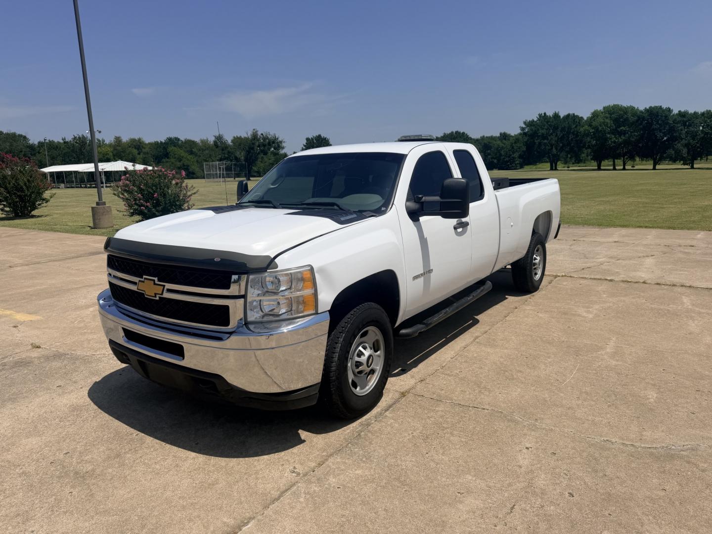 2013 White /BLACK Chevrolet Silverado 2500HD Work Truck Ext. Cab 2WD (1GC2CVCB0DZ) with an 6.0L V8 OHV 16V CNG engine, 6A transmission, located at 17760 Hwy 62, Morris, OK, 74445, (918) 733-4887, 35.609104, -95.877060 - 2013 CHEVY SILVERADO 2500 HD 2WD BI-FUEL SYSTEM RUNS ON CNG OR GASOLINE WITH THE 6.0L V8 ENGINE. IT FEATURES MANUAL SEATS, CLOTH INTERIOR, POWER LOCKS, MANUAL WINDOWS, AM/FM RADIO, CRUSIE CONTROL, TRACTION CONTROL, TAILER BRAKES, SAFETY LIGHT AND BED MATT. ONLY 179,449 MILES WITH FIRESTONE TIRES 245- Photo#0