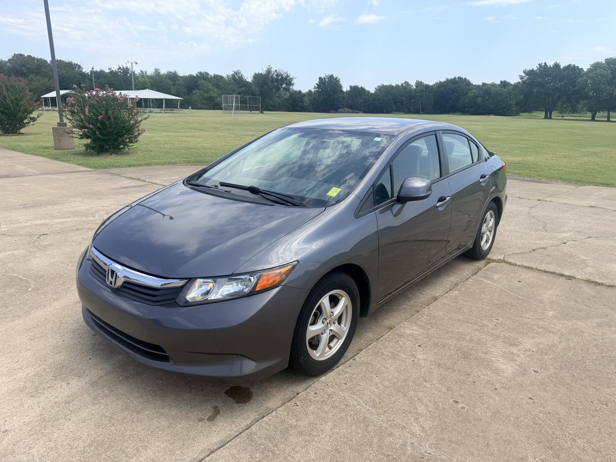 photo of 2012 HONDA CIVIC DEDICATED CNG ONLY RUNS ON COMPRESSED NATURAL GAS $590 TAX CREDIT AVAILABLE.....SEE HOW OKLAHOMAN'S CAN OPERATE FOR LESS THAN $1.00 PER GALLON!!...HIT SHOW MORE BELOW IN OUR DESCRIPTION