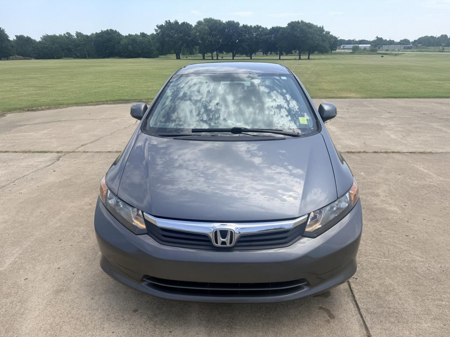 2012 Grey /GRAY Honda Civic CNG (19XFB5F53CE) with an 1.8L L4 SOHC 16V CNG engine, 5-Speed Automatic transmission, located at 17760 Hwy 62, Morris, OK, 74445, (918) 733-4887, 35.609104, -95.877060 - 2012 HONDA CIVIC DEDICATED CNG (RUNS ONLY ON COMPRESSED NATURAL GAS) HAS A 1.8L 4 CYLINDER ENGINE AND IS 2WD. FEATURES MANUAL SEATS, POWER LOCKS, POWER MIRRORS, POWER WINDOWS. HAS AM/FM RADIO, CD PLAYER, AUX PORT, NAVIGATION, CRUISE CONTROL, MULTI-FUNCTION STEERING WHEEL CONTROL, HANDS FREE CALLING- Photo#1
