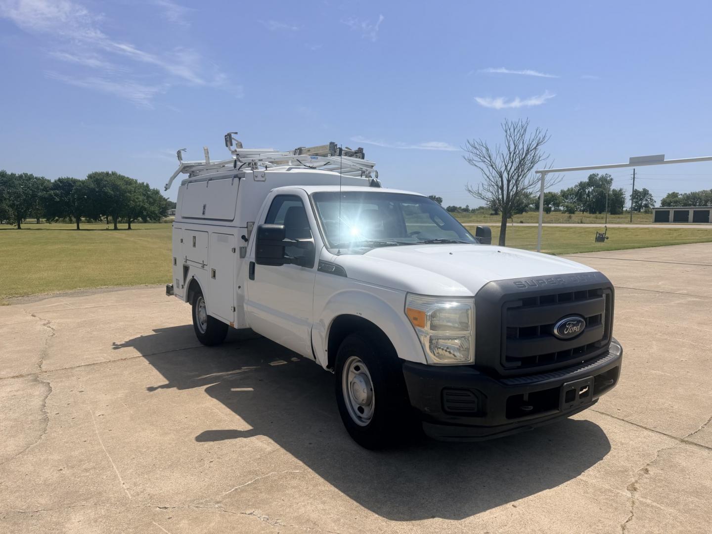 2013 White /GRAY Ford F-350 SD (1FDRF3A66DE) with an 6.2L V8 OHV 16V engine, 6A transmission, located at 17760 Hwy 62, Morris, OK, 74445, (918) 733-4887, 35.609104, -95.877060 - 2013 FORD F-350 6.2 V8 RWD DEDICATED CNG ONLY RUNS ON COMPRESSED NATURAL GAS AND DOES NOT RUN ON GASOLINE. FEATURES MANUAL SEATS, MANUAL LOCKS, MANUAL WINDOWS, MANUAL MIRRORS, AM/FM STEREO, VINYL SEATS, CRUISE CONTROL, TRACTION CONTROL, POWER CONVERTER, GASOLINE CUMMINGS GENERATOR, EASY LOAD LADDER- Photo#2