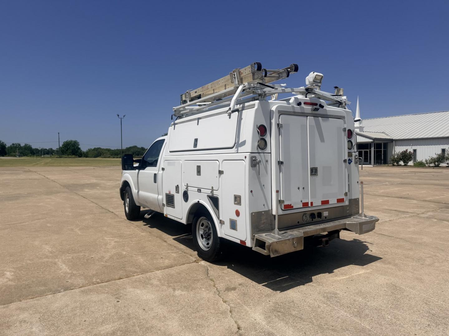2013 White /GRAY Ford F-350 SD (1FDRF3A66DE) with an 6.2L V8 OHV 16V engine, 6A transmission, located at 17760 Hwy 62, Morris, OK, 74445, (918) 733-4887, 35.609104, -95.877060 - 2013 FORD F-350 6.2 V8 RWD DEDICATED CNG ONLY RUNS ON COMPRESSED NATURAL GAS AND DOES NOT RUN ON GASOLINE. FEATURES MANUAL SEATS, MANUAL LOCKS, MANUAL WINDOWS, MANUAL MIRRORS, AM/FM STEREO, VINYL SEATS, CRUISE CONTROL, TRACTION CONTROL, POWER CONVERTER, GASOLINE CUMMINGS GENERATOR, EASY LOAD LADDER- Photo#6