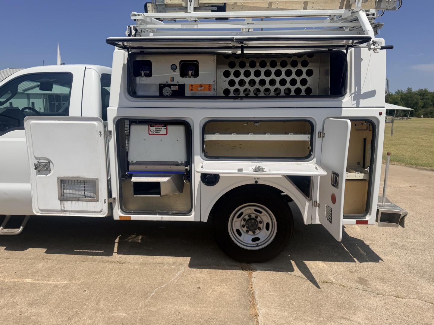 2013 White /GRAY Ford F-350 SD (1FDRF3A66DE) with an 6.2L V8 OHV 16V engine, 6A transmission, located at 17760 Hwy 62, Morris, OK, 74445, (918) 733-4887, 35.609104, -95.877060 - 2013 FORD F-350 6.2 V8 RWD DEDICATED CNG ONLY RUNS ON COMPRESSED NATURAL GAS AND DOES NOT RUN ON GASOLINE. FEATURES MANUAL SEATS, MANUAL LOCKS, MANUAL WINDOWS, MANUAL MIRRORS, AM/FM STEREO, VINYL SEATS, CRUISE CONTROL, TRACTION CONTROL, POWER CONVERTER, GASOLINE CUMMINGS GENERATOR, EASY LOAD LADDER- Photo#16
