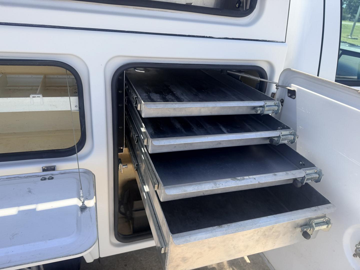 2013 White /GRAY Ford F-350 SD (1FDRF3A66DE) with an 6.2L V8 OHV 16V engine, 6A transmission, located at 17760 Hwy 62, Morris, OK, 74445, (918) 733-4887, 35.609104, -95.877060 - 2013 FORD F-350 6.2 V8 RWD DEDICATED CNG ONLY RUNS ON COMPRESSED NATURAL GAS AND DOES NOT RUN ON GASOLINE. FEATURES MANUAL SEATS, MANUAL LOCKS, MANUAL WINDOWS, MANUAL MIRRORS, AM/FM STEREO, VINYL SEATS, CRUISE CONTROL, TRACTION CONTROL, POWER CONVERTER, GASOLINE CUMMINGS GENERATOR, EASY LOAD LADDER- Photo#24