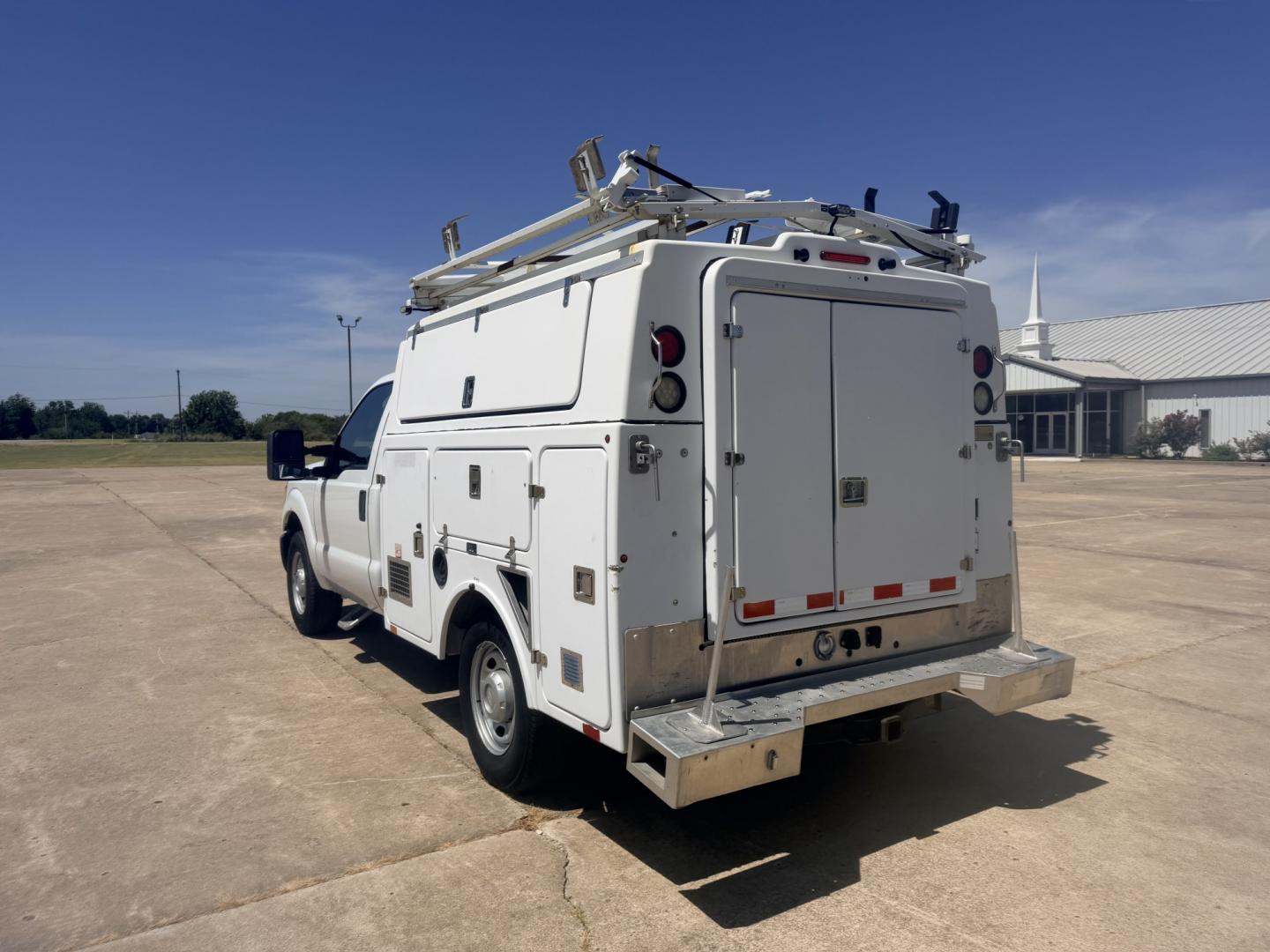 2013 White /GRAY Ford F-350 SD (1FDRF3A60DE) with an 6.2L V8 OHV 16V engine, 6A transmission, located at 17760 Hwy 62, Morris, OK, 74445, (918) 733-4887, 35.609104, -95.877060 - 2013 FORD F-350 6.2L V8 2WD DEDICATED CNG ONLY RUNS ON COMPRESSED NATURAL GAS AND DOES NOT RUN ON GASOLINE. FEATURES MANUAL SEATS, MANUAL LOCKS, MANUAL WINDOWS, MANUAL MIRRORS, AM/FM STEREO, VINYL SEATS, CRUISE CONTROL, TRACTION CONTROL, POWER CONVERTER, EASY LOAD LADDER RACK, BACK UP CAMERA,AND L- Photo#6