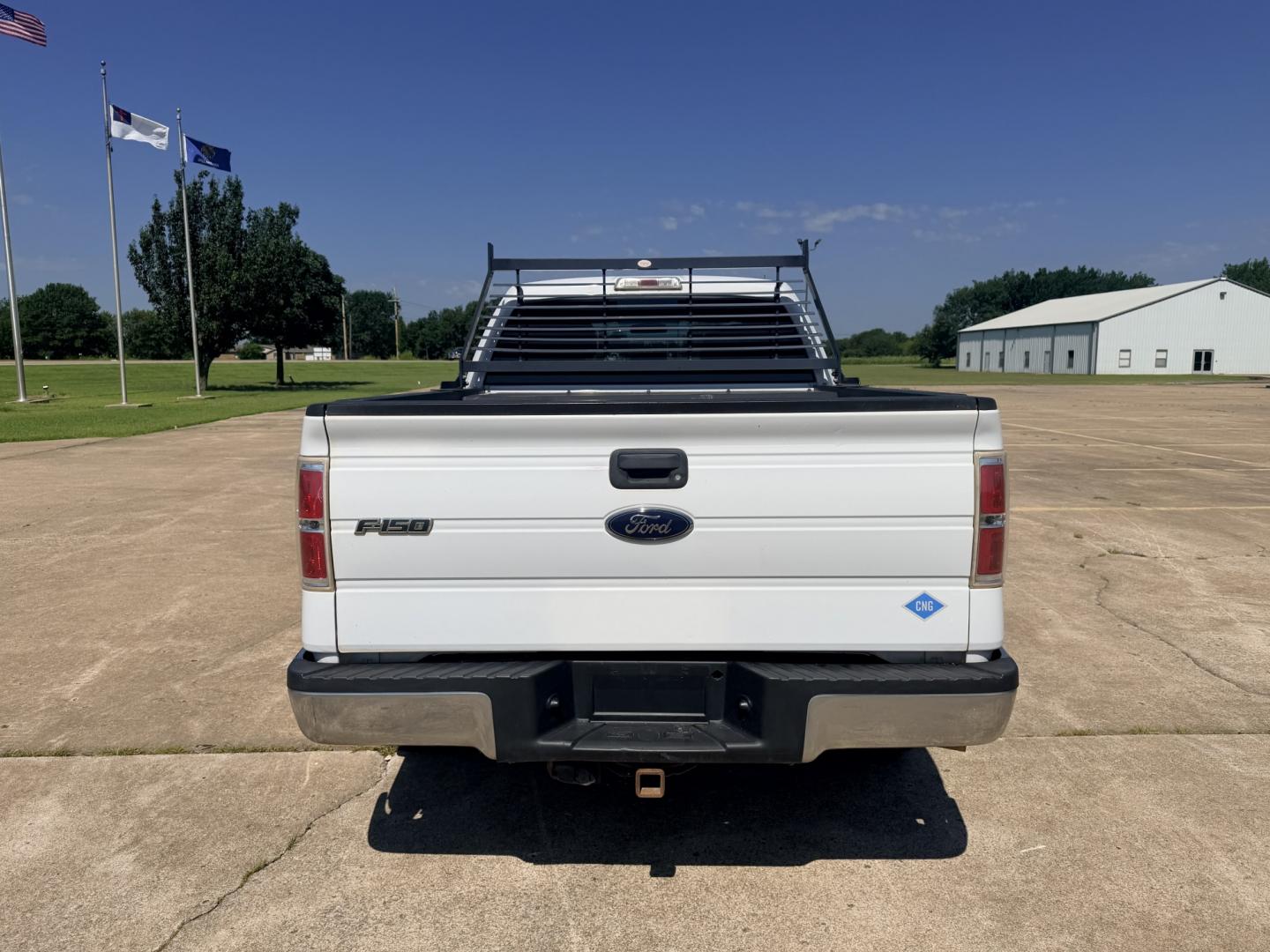 2014 White /GRAY Ford F-150 XL (1FTEX1CM6EK) with an 3.7L V6 DOHC 24V engine, 6A transmission, located at 17760 Hwy 62, Morris, OK, 74445, (918) 733-4887, 35.609104, -95.877060 - 2014 FORD F-150 2WD 3.7L V6 BI-FUEL SYSTEM RUNS ON CNG OR GASOLINE. FEATURES KEYLESS REMOTE ENTRY, POWER LOCKS, POWER WINDOWS, MANUAL SEATS, CLOTH INTERIOR, AM/FM STEREO, SIRIUS XM STEREO, CD PLAYER, AUXILLARY PORT, CRUISE CONTROL, TRACTION CONTROL, AND MULTI-FUNCTIONING STEERING WHEEL CONTROLS, AND- Photo#5