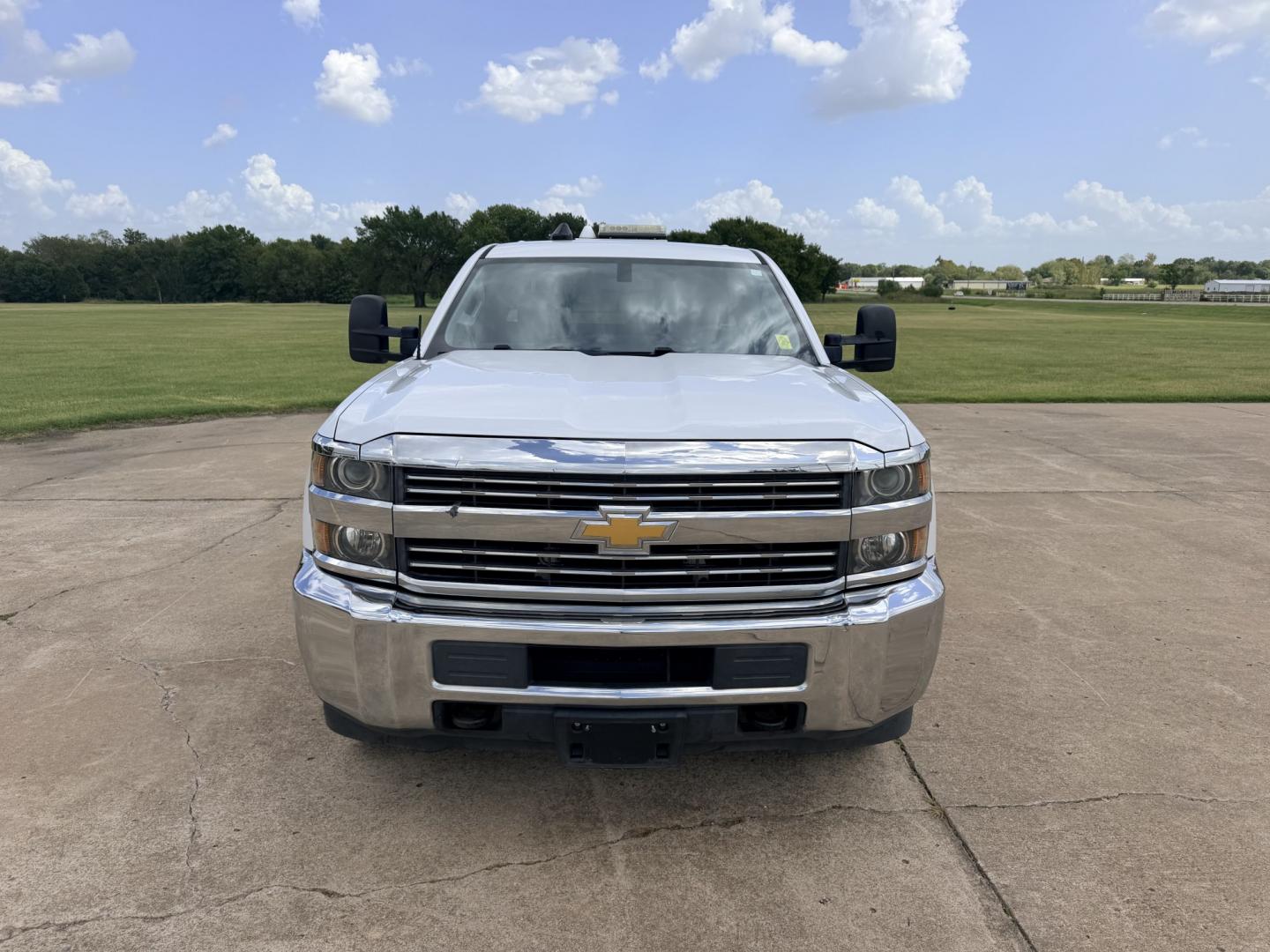 2016 White /Gray Chevrolet Silverado 2500HD Work Truck Double Cab 2WD (1GC2CUEG6GZ) with an 6.0L V8 OHV 16V FFV engine, 6A transmission, located at 17760 Hwy 62, Morris, OK, 74445, (918) 733-4887, 35.609104, -95.877060 - 2016 CHEVY SILVERADO 2500 HD 2WD BI-FUEL SYSTEM THAT RUNS ON CNG OR GASOLINE WITH 6.0L V8 ENIGINE. IT FEATURES POWER LOCKS, POWER WINDOWS, MANUAL SEATS, CLOTH INTERIOR, CRUSIE CONTROL, TRACTION CONTROL, BACKUP CAMERA, AM/FM RADIO, NO BACK SEAT HAS OPEN TOOL BOX, PIPE VISE, AND TOOL BED. ONLY 173,105- Photo#2