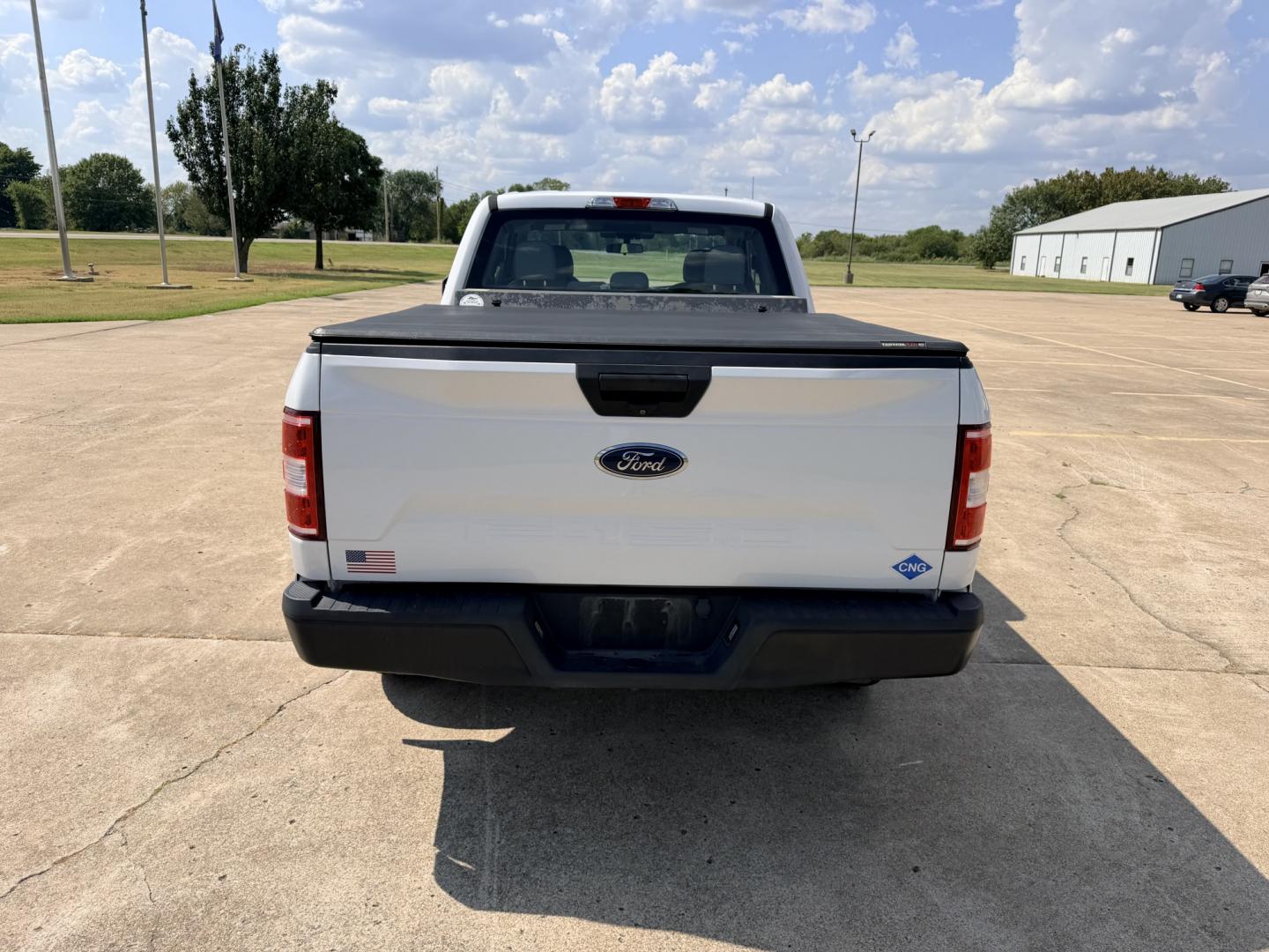 2019 White /Gray Ford F-150 (1FTFX1E54KK) with an 5.0L V8 OHV 16V engine, 6A transmission, located at 17760 Hwy 62, Morris, OK, 74445, (918) 733-4887, 35.609104, -95.877060 - 2019 FORD F150 HAS A 5.0L V8 ENGINE AND IS 4WD. FEATURES KEYLESS ENTERY, LEATHER INTERIOR, POWER WINDOWS, POWER LOCKS, POWER MIRRORS, AM/FM RADIO, HANDS FREE CALLING, A/C, TRACTION CONTROL,USB PORT, BACKUP CAMERA, BED COVER, AND BED LINER. EQUIPPED WITH A BI-FUEL CNG FUEL SYSTEM. IT RUNS ON COMPRESS- Photo#5
