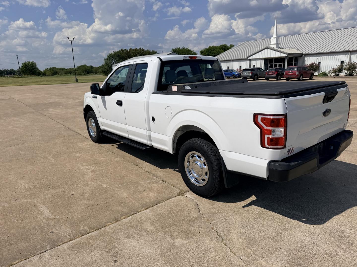 2019 White /Gray Ford F-150 (1FTFX1E54KK) with an 5.0L V8 OHV 16V engine, 6A transmission, located at 17760 Hwy 62, Morris, OK, 74445, (918) 733-4887, 35.609104, -95.877060 - 2019 FORD F150 HAS A 5.0L V8 ENGINE AND IS 4WD. FEATURES KEYLESS ENTERY, LEATHER INTERIOR, POWER WINDOWS, POWER LOCKS, POWER MIRRORS, AM/FM RADIO, HANDS FREE CALLING, A/C, TRACTION CONTROL,USB PORT, BACKUP CAMERA, BED COVER, AND BED LINER. EQUIPPED WITH A BI-FUEL CNG FUEL SYSTEM. IT RUNS ON COMPRESS- Photo#6