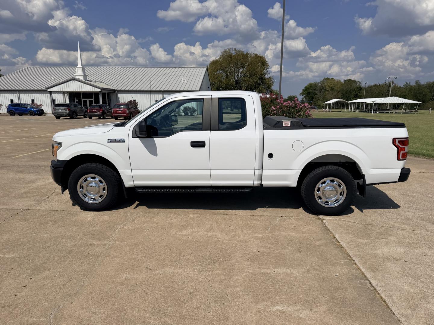 2019 White /Gray Ford F-150 (1FTFX1E54KK) with an 5.0L V8 OHV 16V engine, 6A transmission, located at 17760 Hwy 62, Morris, OK, 74445, (918) 733-4887, 35.609104, -95.877060 - 2019 FORD F150 HAS A 5.0L V8 ENGINE AND IS 4WD. FEATURES KEYLESS ENTERY, LEATHER INTERIOR, POWER WINDOWS, POWER LOCKS, POWER MIRRORS, AM/FM RADIO, HANDS FREE CALLING, A/C, TRACTION CONTROL,USB PORT, BACKUP CAMERA, BED COVER, AND BED LINER. EQUIPPED WITH A BI-FUEL CNG FUEL SYSTEM. IT RUNS ON COMPRESS- Photo#7