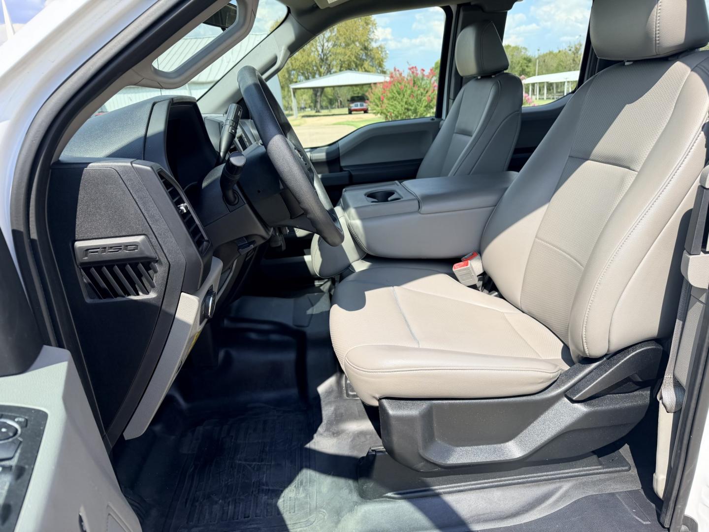 2019 White /Gray Ford F-150 (1FTFX1E54KK) with an 5.0L V8 OHV 16V engine, 6A transmission, located at 17760 Hwy 62, Morris, OK, 74445, (918) 733-4887, 35.609104, -95.877060 - 2019 FORD F150 HAS A 5.0L V8 ENGINE AND IS 4WD. FEATURES KEYLESS ENTERY, LEATHER INTERIOR, POWER WINDOWS, POWER LOCKS, POWER MIRRORS, AM/FM RADIO, HANDS FREE CALLING, A/C, TRACTION CONTROL,USB PORT, BACKUP CAMERA, BED COVER, AND BED LINER. EQUIPPED WITH A BI-FUEL CNG FUEL SYSTEM. IT RUNS ON COMPRESS- Photo#8