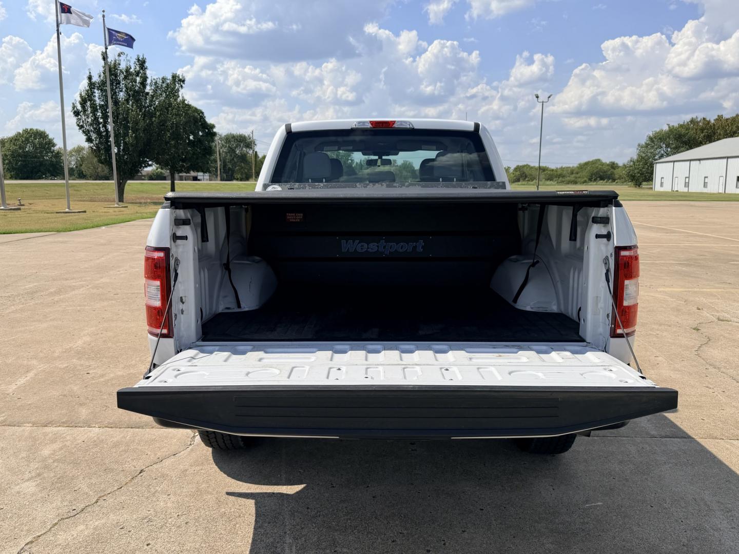 2019 White /Gray Ford F-150 (1FTFX1E54KK) with an 5.0L V8 OHV 16V engine, 6A transmission, located at 17760 Hwy 62, Morris, OK, 74445, (918) 733-4887, 35.609104, -95.877060 - 2019 FORD F150 HAS A 5.0L V8 ENGINE AND IS 4WD. FEATURES KEYLESS ENTERY, LEATHER INTERIOR, POWER WINDOWS, POWER LOCKS, POWER MIRRORS, AM/FM RADIO, HANDS FREE CALLING, A/C, TRACTION CONTROL,USB PORT, BACKUP CAMERA, BED COVER, AND BED LINER. EQUIPPED WITH A BI-FUEL CNG FUEL SYSTEM. IT RUNS ON COMPRESS- Photo#17