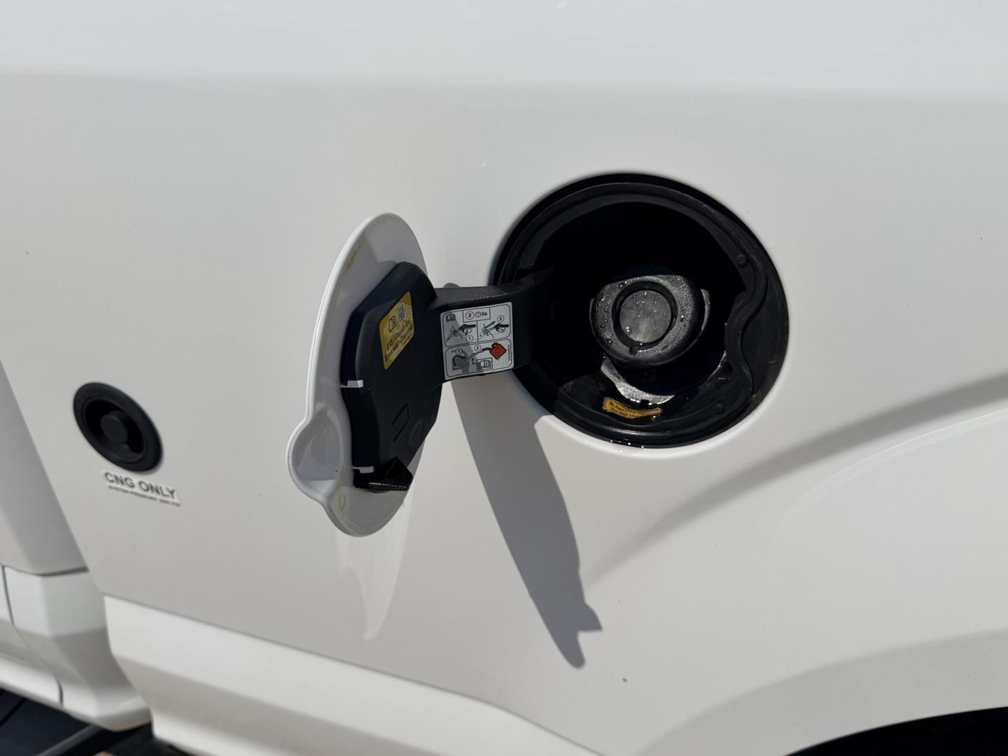 2019 White /Gray Ford F-150 (1FTFX1E54KK) with an 5.0L V8 OHV 16V engine, 6A transmission, located at 17760 Hwy 62, Morris, OK, 74445, (918) 733-4887, 35.609104, -95.877060 - 2019 FORD F150 HAS A 5.0L V8 ENGINE AND IS 4WD. FEATURES KEYLESS ENTERY, LEATHER INTERIOR, POWER WINDOWS, POWER LOCKS, POWER MIRRORS, AM/FM RADIO, HANDS FREE CALLING, A/C, TRACTION CONTROL,USB PORT, BACKUP CAMERA, BED COVER, AND BED LINER. EQUIPPED WITH A BI-FUEL CNG FUEL SYSTEM. IT RUNS ON COMPRESS- Photo#18