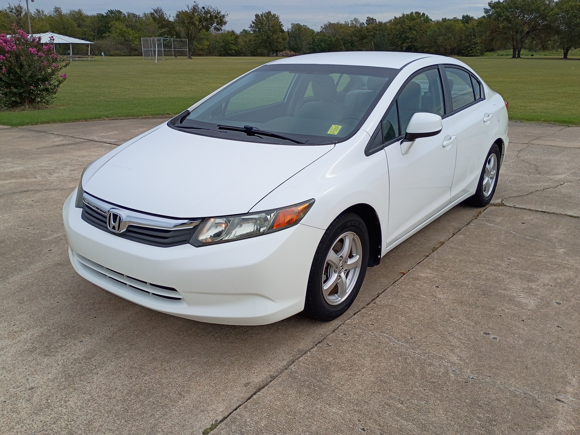 photo of 2012 HONDA CIVIC DEDICATED CNG THAT ONLY RUNS ON COMPRESSED NATURAL GAS $890 TAX CREDIT AVAILABLE......SEE HOW OKLAHOMAN'S CAN OPERATE FOR LESS THAN $1.00 PER GALLON!!...HIT SHOW MORE BELOW IN OUR DESCRIPTION
