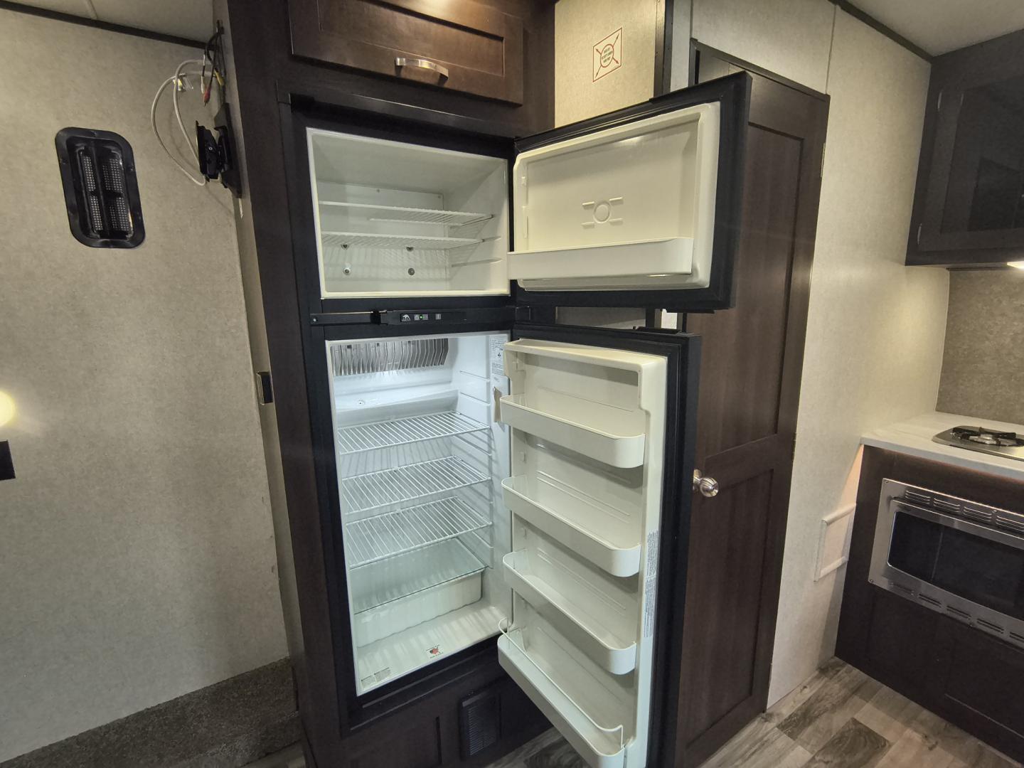 2020 White /BROWN Jayco OCTANE SL 161 161 (1UJBJSBJ7L1) , located at 17760 Hwy 62, Morris, OK, 74445, 35.609104, -95.877060 - READY FOR YOUR NEXT GETAWAY? CHECK OUT THIS 2020 JAYCO OCTANE SL 161 12FT OVERALL TOY HAULER! WHETHER YOU'RE HEADING OUT FOR A WEEKEND OF ATV RIDING, DIRT BIKING, OR RELAXING AT YOUR FAVORITE CAMPGROUND, THIS VERSATILE TOY HAULER LETS YOU BRING THE FUN WITH YOU. ENJOY THE FREEDOM OF THE OPEN ROAD AN- Photo#21