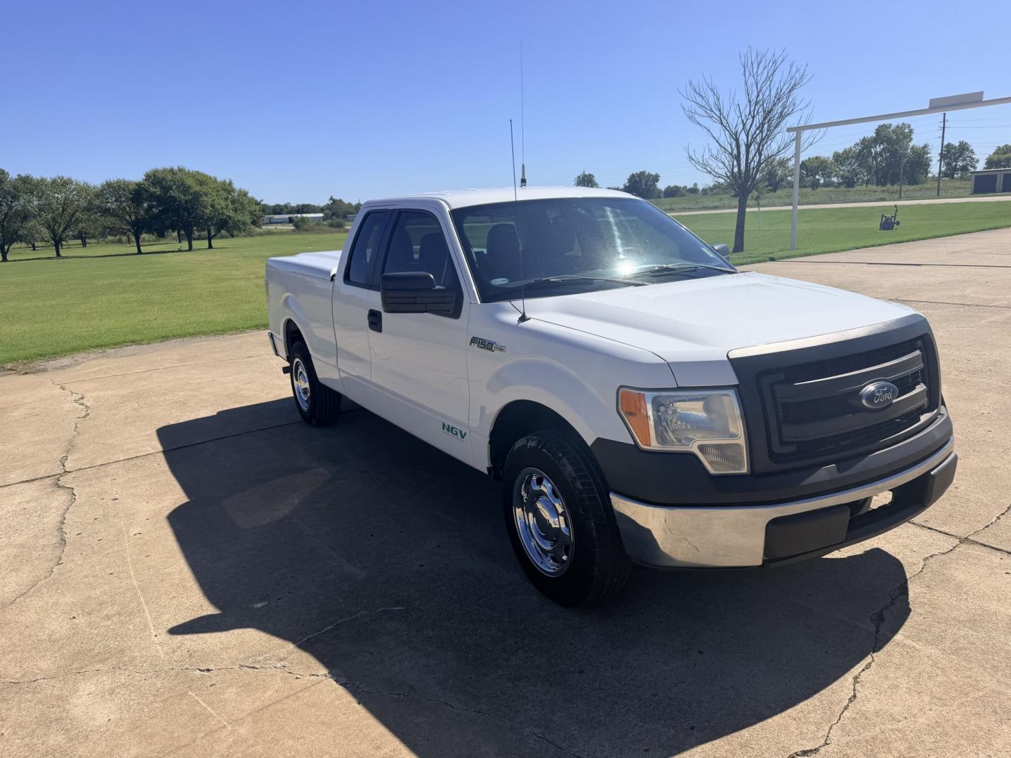 2014 White /GRAY Ford F-150 (1FTEX1CM0EK) with an 3.7L V6 DOHC 24V engine, 6A transmission, located at 17760 Hwy 62, Morris, OK, 74445, (918) 733-4887, 35.609104, -95.877060 - 2014 FORD F-150 2WD 3.7L V6 BI-FUEL SYSTEM RUNS ON CNG OR GASOLINE. FEATURES KEYLESS REMOTE ENTRY, POWER LOCKS, POWER WINDOWS, AM/FM TOUCHSCREEN STEREO, AUXILLARY PORT, CRUISE CONTROL, TRACTION CONTROL, MULTI-FUNCTIONING STEERING WHEEL CONTROLS, TRAILER HITCH, AND BED COVER. HAS 216,675 MILES WITH- Photo#2
