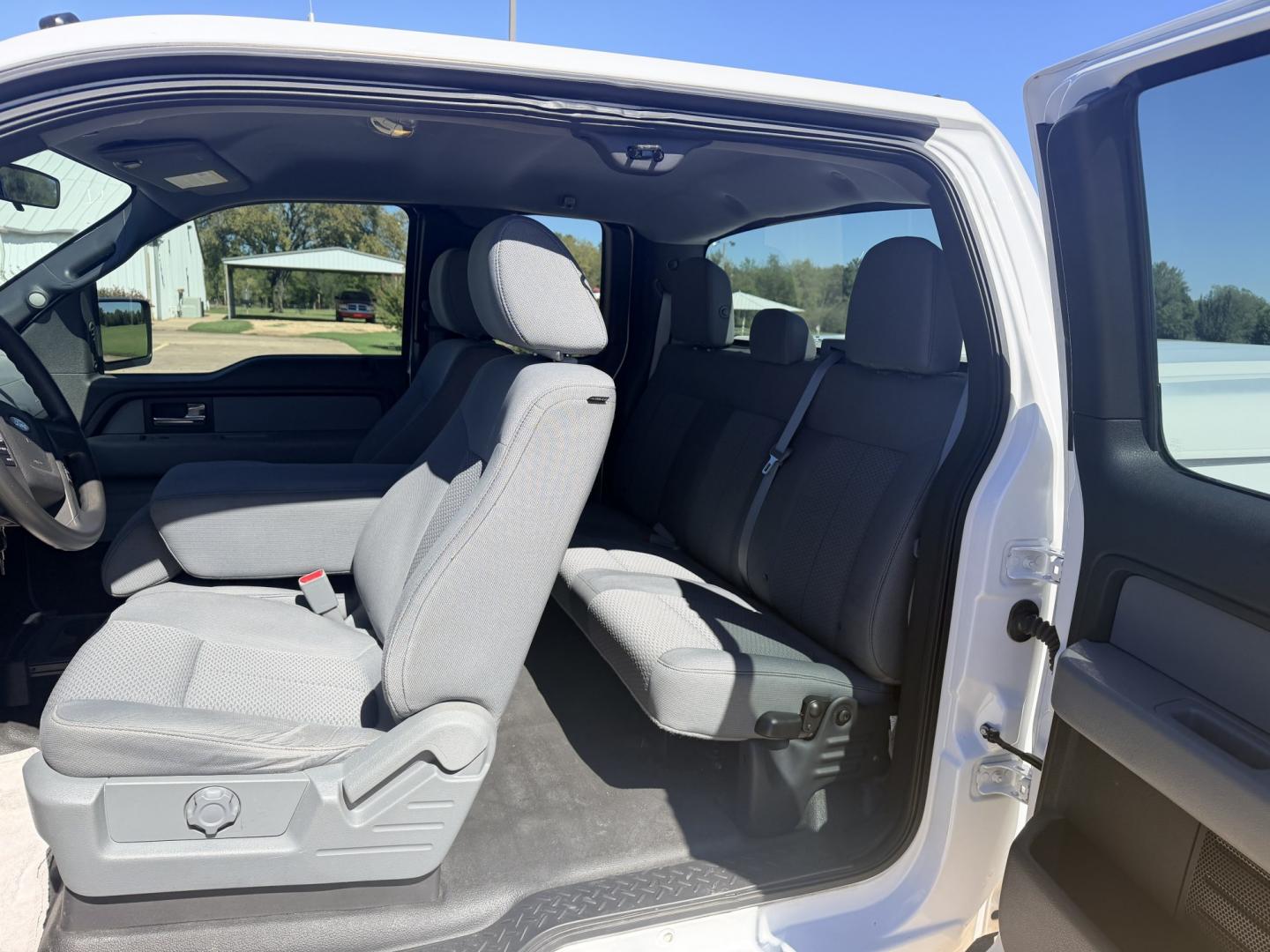 2014 White /GRAY Ford F-150 (1FTEX1CM0EK) with an 3.7L V6 DOHC 24V engine, 6A transmission, located at 17760 Hwy 62, Morris, OK, 74445, (918) 733-4887, 35.609104, -95.877060 - 2014 FORD F-150 2WD 3.7L V6 BI-FUEL SYSTEM RUNS ON CNG OR GASOLINE. FEATURES KEYLESS REMOTE ENTRY, POWER LOCKS, POWER WINDOWS, AM/FM TOUCHSCREEN STEREO, AUXILLARY PORT, CRUISE CONTROL, TRACTION CONTROL, MULTI-FUNCTIONING STEERING WHEEL CONTROLS, TRAILER HITCH, AND BED COVER. HAS 216,675 MILES WITH- Photo#9