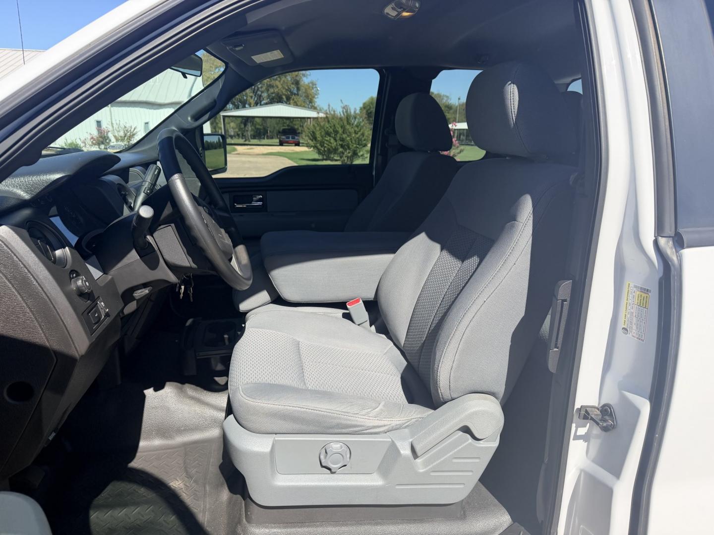 2014 White /GRAY Ford F-150 (1FTEX1CM0EK) with an 3.7L V6 DOHC 24V engine, 6A transmission, located at 17760 Hwy 62, Morris, OK, 74445, (918) 733-4887, 35.609104, -95.877060 - 2014 FORD F-150 2WD 3.7L V6 BI-FUEL SYSTEM RUNS ON CNG OR GASOLINE. FEATURES KEYLESS REMOTE ENTRY, POWER LOCKS, POWER WINDOWS, AM/FM TOUCHSCREEN STEREO, AUXILLARY PORT, CRUISE CONTROL, TRACTION CONTROL, MULTI-FUNCTIONING STEERING WHEEL CONTROLS, TRAILER HITCH, AND BED COVER. HAS 216,675 MILES WITH- Photo#8