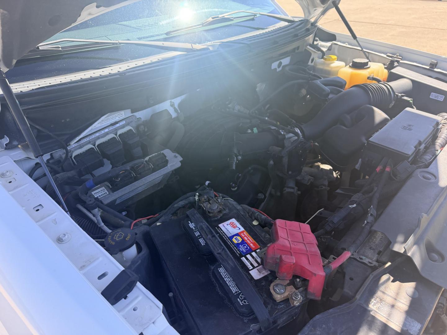 2014 White /GRAY Ford F-150 (1FTEX1CM0EK) with an 3.7L V6 DOHC 24V engine, 6A transmission, located at 17760 Hwy 62, Morris, OK, 74445, (918) 733-4887, 35.609104, -95.877060 - 2014 FORD F-150 2WD 3.7L V6 BI-FUEL SYSTEM RUNS ON CNG OR GASOLINE. FEATURES KEYLESS REMOTE ENTRY, POWER LOCKS, POWER WINDOWS, AM/FM TOUCHSCREEN STEREO, AUXILLARY PORT, CRUISE CONTROL, TRACTION CONTROL, MULTI-FUNCTIONING STEERING WHEEL CONTROLS, TRAILER HITCH, AND BED COVER. HAS 216,675 MILES WITH- Photo#21