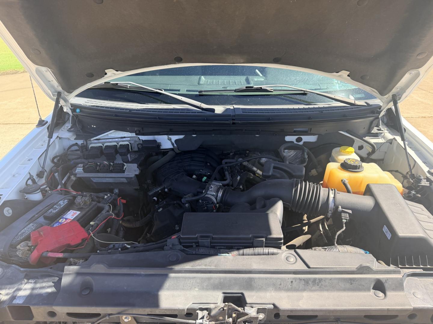 2014 White /GRAY Ford F-150 (1FTEX1CM0EK) with an 3.7L V6 DOHC 24V engine, 6A transmission, located at 17760 Hwy 62, Morris, OK, 74445, (918) 733-4887, 35.609104, -95.877060 - 2014 FORD F-150 2WD 3.7L V6 BI-FUEL SYSTEM RUNS ON CNG OR GASOLINE. FEATURES KEYLESS REMOTE ENTRY, POWER LOCKS, POWER WINDOWS, AM/FM TOUCHSCREEN STEREO, AUXILLARY PORT, CRUISE CONTROL, TRACTION CONTROL, MULTI-FUNCTIONING STEERING WHEEL CONTROLS, TRAILER HITCH, AND BED COVER. HAS 216,675 MILES WITH- Photo#19