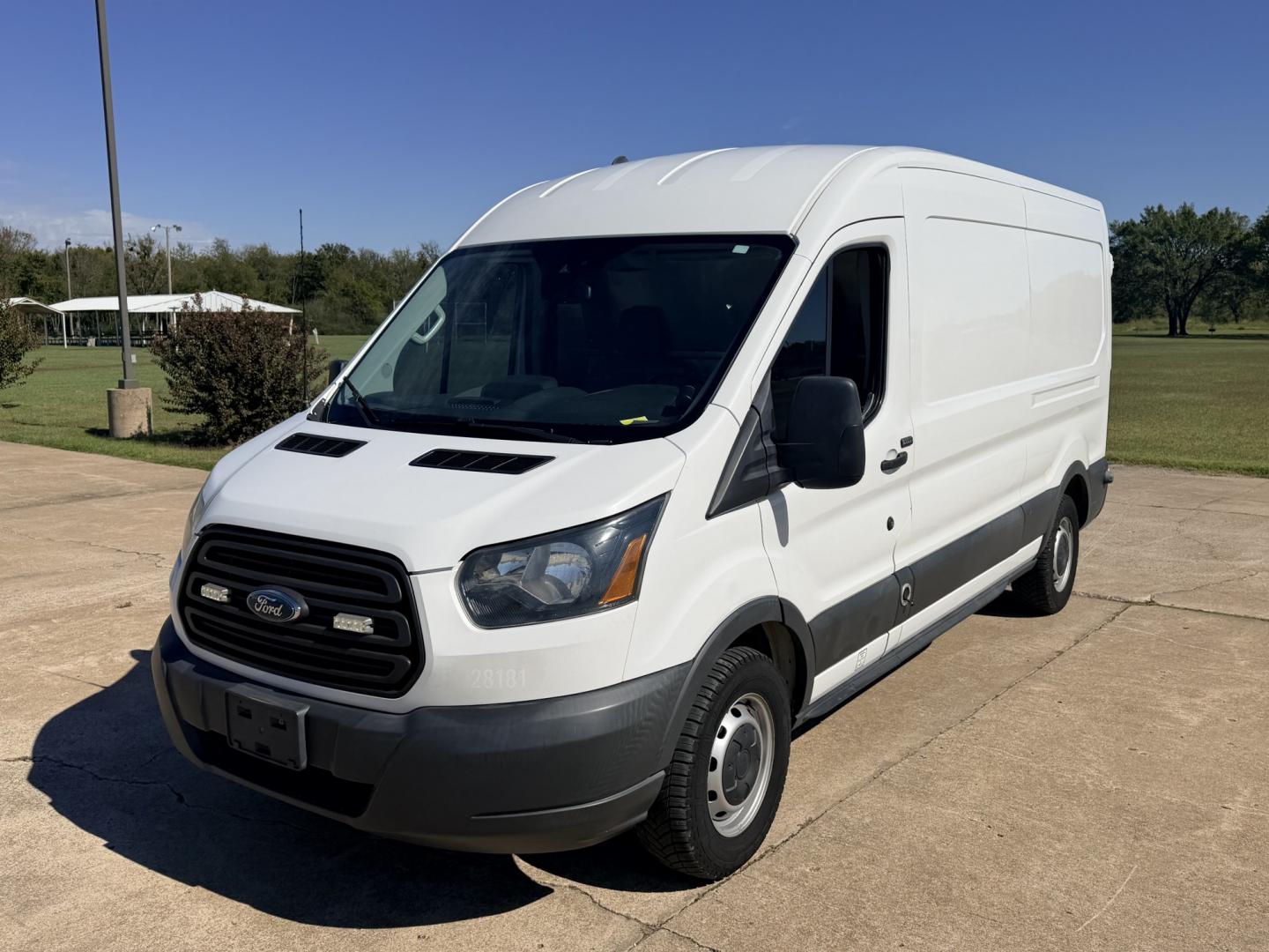 2017 White /BLACK Ford Transit 250 Van Med. Roof w/Sliding Pass. 148-in. WB (1FTYR2CM1HK) with an 3.7L V6 DOHC 24V engine, 6A transmission, located at 17760 Hwy 62, Morris, OK, 74445, (918) 733-4887, 35.609104, -95.877060 - 2017 FORD TRANSIT 250 HIGH TOP BI-FUEL SYSTEM RUNS ON CNG OR GASOLINE HAS THE 3.7L V6 ENIGINE. ***CLEAN TITLE*** IT FEATURES KEYLESS ENTRY, CLOTH INTERIOR, MANUAL SEATS, POWER WINDOWS, POWER LOCKS, POWER MIRRORS, CRUISE CONTROL, HANDS FREE CALLING, AM/FM RADIO, SIRIUS RADIO, BLUETOOTH RADIO, BACKUP- Photo#0