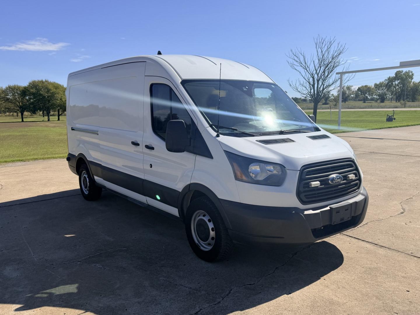 2017 White /BLACK Ford Transit 250 Van Med. Roof w/Sliding Pass. 148-in. WB (1FTYR2CM1HK) with an 3.7L V6 DOHC 24V engine, 6A transmission, located at 17760 Hwy 62, Morris, OK, 74445, (918) 733-4887, 35.609104, -95.877060 - 2017 FORD TRANSIT 250 HIGH TOP BI-FUEL SYSTEM RUNS ON CNG OR GASOLINE HAS THE 3.7L V6 ENIGINE. ***CLEAN TITLE*** IT FEATURES KEYLESS ENTRY, CLOTH INTERIOR, MANUAL SEATS, POWER WINDOWS, POWER LOCKS, POWER MIRRORS, CRUISE CONTROL, HANDS FREE CALLING, AM/FM RADIO, SIRIUS RADIO, BLUETOOTH RADIO, BACKUP- Photo#3