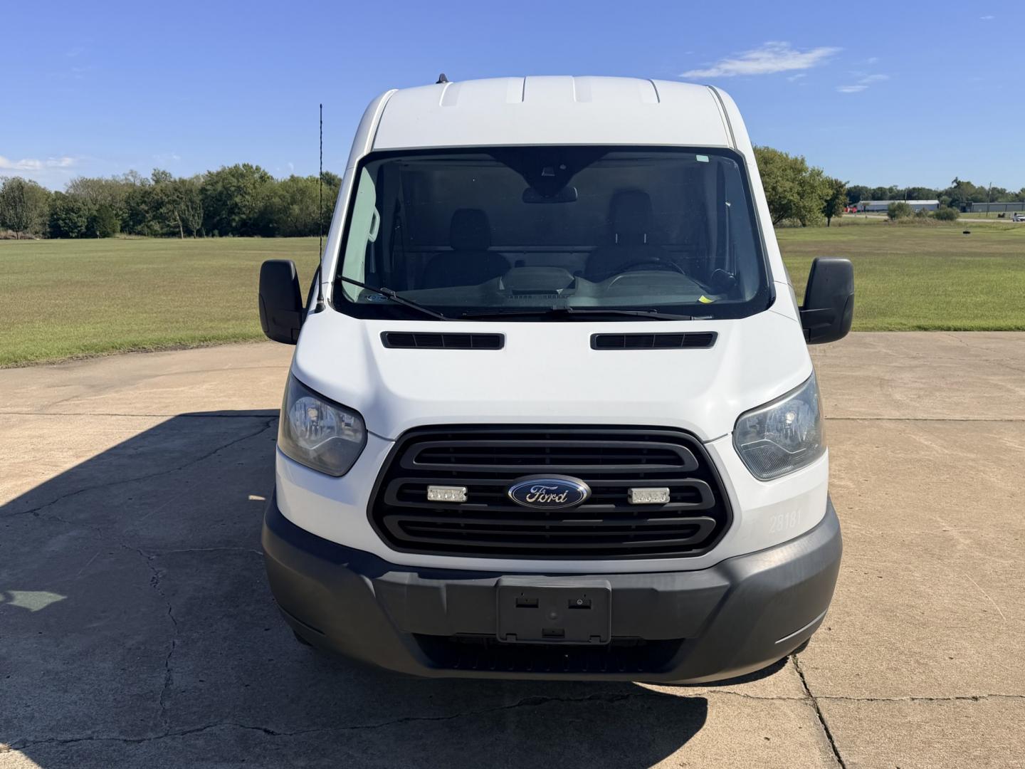 2017 White /BLACK Ford Transit 250 Van Med. Roof w/Sliding Pass. 148-in. WB (1FTYR2CM1HK) with an 3.7L V6 DOHC 24V engine, 6A transmission, located at 17760 Hwy 62, Morris, OK, 74445, (918) 733-4887, 35.609104, -95.877060 - 2017 FORD TRANSIT 250 HIGH TOP BI-FUEL SYSTEM RUNS ON CNG OR GASOLINE HAS THE 3.7L V6 ENIGINE. ***CLEAN TITLE*** IT FEATURES KEYLESS ENTRY, CLOTH INTERIOR, MANUAL SEATS, POWER WINDOWS, POWER LOCKS, POWER MIRRORS, CRUISE CONTROL, HANDS FREE CALLING, AM/FM RADIO, SIRIUS RADIO, BLUETOOTH RADIO, BACKUP- Photo#2