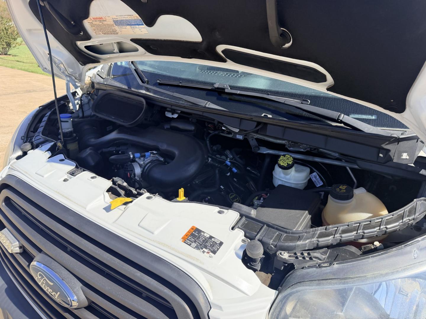 2017 White /BLACK Ford Transit 250 Van Med. Roof w/Sliding Pass. 148-in. WB (1FTYR2CM1HK) with an 3.7L V6 DOHC 24V engine, 6A transmission, located at 17760 Hwy 62, Morris, OK, 74445, (918) 733-4887, 35.609104, -95.877060 - 2017 FORD TRANSIT 250 HIGH TOP BI-FUEL SYSTEM RUNS ON CNG OR GASOLINE HAS THE 3.7L V6 ENIGINE. ***CLEAN TITLE*** IT FEATURES KEYLESS ENTRY, CLOTH INTERIOR, MANUAL SEATS, POWER WINDOWS, POWER LOCKS, POWER MIRRORS, CRUISE CONTROL, HANDS FREE CALLING, AM/FM RADIO, SIRIUS RADIO, BLUETOOTH RADIO, BACKUP- Photo#25