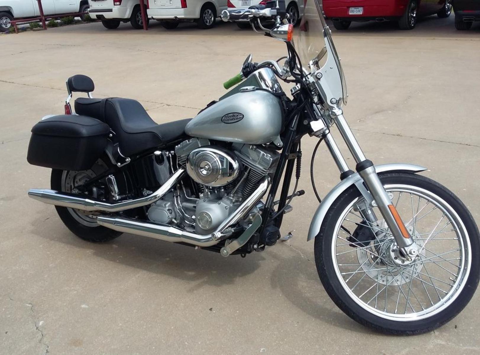 2004 Silver Harley-Davidson FXSTI - (1HD1BVB164Y) with an 1450CC engine, Standard transmission, located at 17760 HWY 62, MORRIS, 74445, 35.609104, -95.877060 - 2004 HARLEY-DAVIDSON FXSTI SOFTAIL STANDARD 1450CC FEATURES HARLEY SADDLEBAGS, AN ACCESSORY BAG ON THE TANK, SILVER POWDER-COATED ENGINE AND COVERS, HARDTAIL STYLING WITH HIDDEN HORIZONTAL REAR SHOCKS, BLACK HORSESHOE OIL TANK, BOBTAIL FENDER, RAKED FRONT FORKS. ALWAYS GARAGE KEPT!! IT'S IN EXCELLE - Photo #1