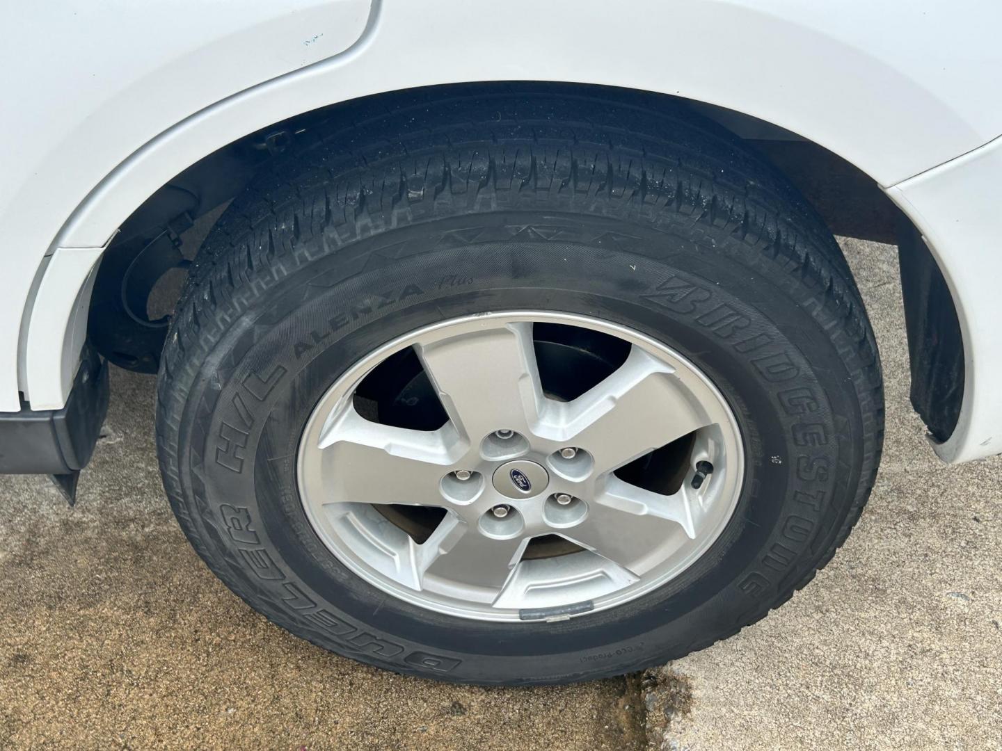 2011 WHITE /Gray Ford Escape (1FMCU9C75BK) with an 2.5L L4 DOHC 16V engine, 6-Speed Automatic transmission, located at 17760 Hwy 62, Morris, OK, 74445, (918) 733-4887, 35.609104, -95.877060 - 2011 FORD ESCAPE AWD AND HAS THE 2.5L L4 ENGINE. DEDICATED CNG ONLY RUNS ON COMPRESSED NATURAL GAS. IT FEATURES CLOTH INTERIOR, MANUAL SEATS, POWER WINDOWS, POWER LOCKS,CRUISE CONTROL, AM/FM RADIO, SIRIUS RADIO, CD PLAYER, AUXILARY PORT, AND HAND FREE CALLING. TIRES 235/70R16 AND ONLY HAS 111,801 M - Photo#25